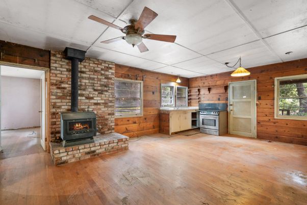 Empty room, Fireplace, Interior, Kitchen, Stone Walls, Wood Texture Flooring, Wooden Walls