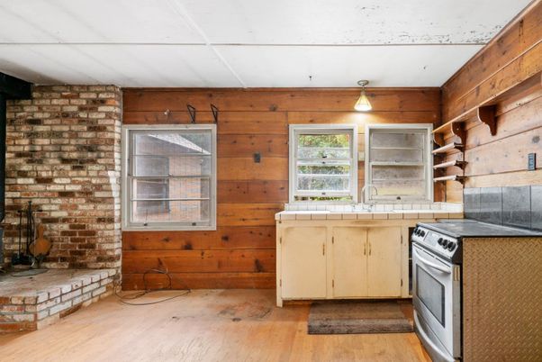 Interior, Kitchen, Stone Walls, Tile Countertops, Wood Texture Flooring, Wooden Walls