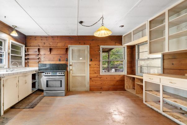 Interior, Kitchen, Pendant Lights, Stainless Steel Appliances, Wood Texture Flooring, Wooden Walls