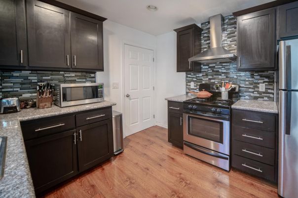 Interior, Kitchen, Recessed Lighting, Stainless Steel Appliances, Wood Texture Flooring