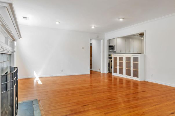 Empty room, Interior, Kitchen, Recessed Lighting, Stainless Steel Appliances, Wood Texture Flooring