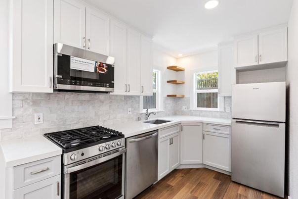Interior, Kitchen, Recessed Lighting, Stainless Steel Appliances, Wood Texture Flooring