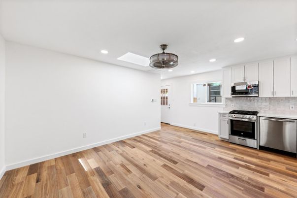 Interior, Kitchen, Recessed Lighting, Stainless Steel Appliances, Wood Texture Flooring