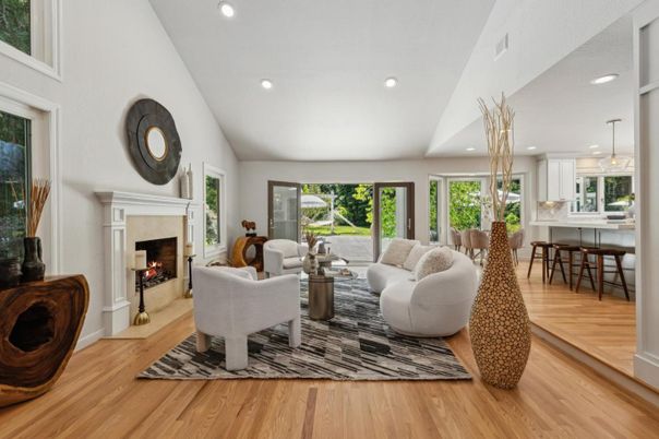 Dining room, Fireplace, Interior, Living room, Pendant Lights, Recessed Lighting, Wood Texture Flooring