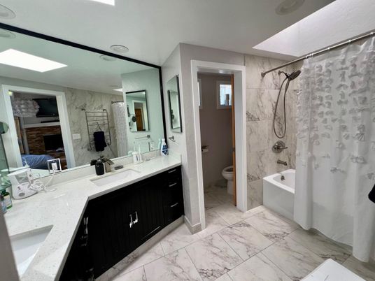 Bathroom, Dual Sink Vanities, Interior, Marble, Marble Walls, Recessed Lighting