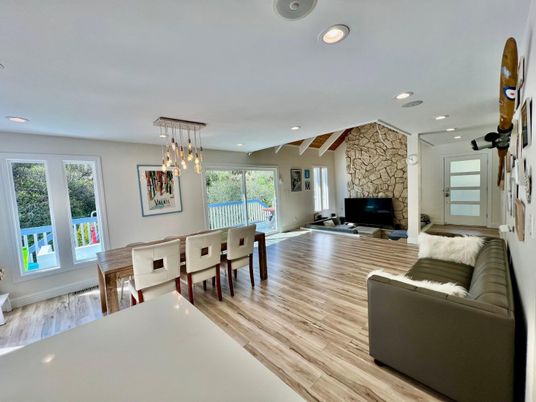 Dining room, Fireplace, Interior, Living room, Pendant Lights, Recessed Lighting, Stone Walls, Wood Texture Flooring