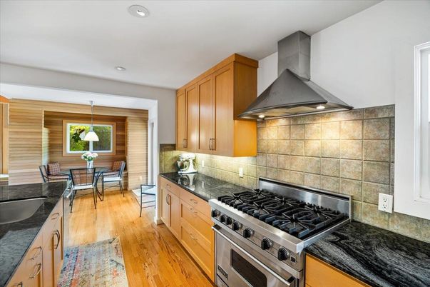 Dining room, Interior, Kitchen, Pendant Lights, Recessed Lighting, Stainless Steel Appliances, Wood Texture Flooring