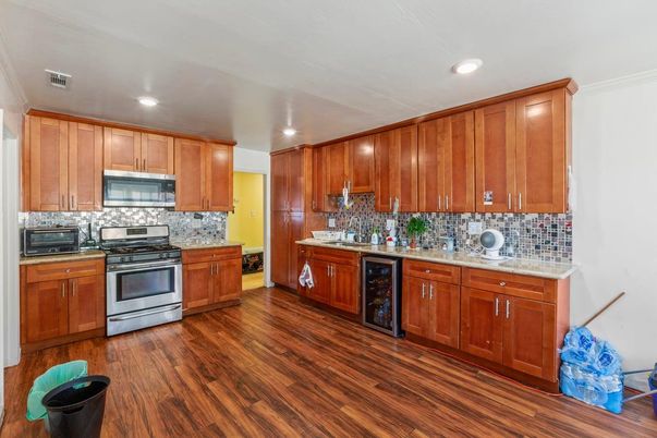 Interior, Kitchen, Recessed Lighting, Stainless Steel Appliances, Wood Texture Flooring