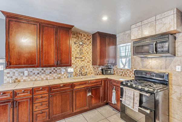 Interior, Kitchen, Recessed Lighting, Tile Countertops