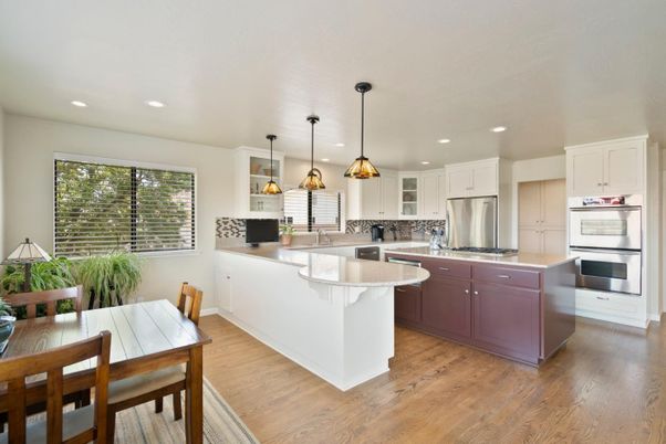 Dining room, Interior, Kitchen, Pendant Lights, Recessed Lighting, Stainless Steel Appliances, Wood Texture Flooring