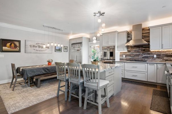 Dining room, Interior, Kitchen, Pendant Lights, Stainless Steel Appliances, Wood Texture Flooring