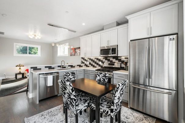 Dining room, Interior, Kitchen, Pendant Lights, Recessed Lighting, Stainless Steel Appliances, Wood Texture Flooring