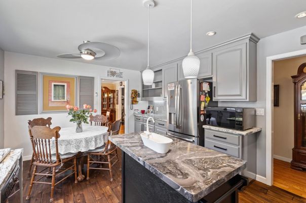 Dining room, Interior, Kitchen, Pendant Lights, Recessed Lighting, Stainless Steel Appliances, Wood Texture Flooring