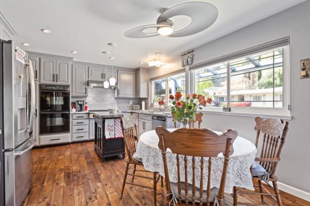 Dining room, Interior, Kitchen, Pendant Lights, Recessed Lighting, Stainless Steel Appliances, Wood Texture Flooring