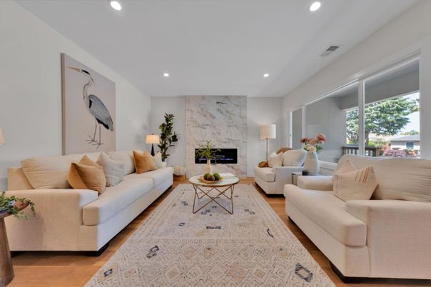 Fireplace, Interior, Living room, Marble Walls, Recessed Lighting, Wood Texture Flooring