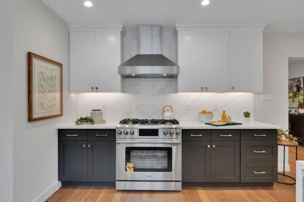 Interior, Kitchen, Marble Walls, Recessed Lighting, Stainless Steel Appliances, Wood Texture Flooring