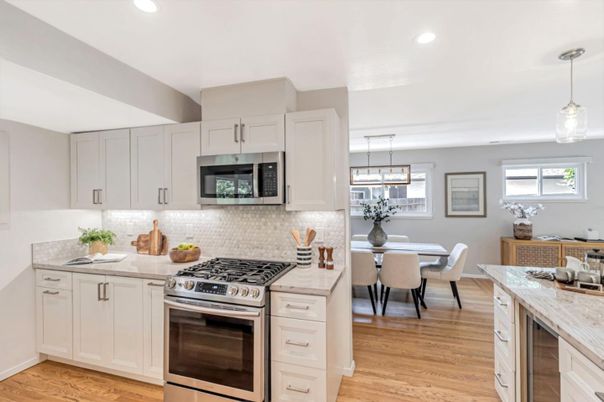 Dining room, Interior, Kitchen, Pendant Lights, Recessed Lighting, Stainless Steel Appliances, Wood Texture Flooring