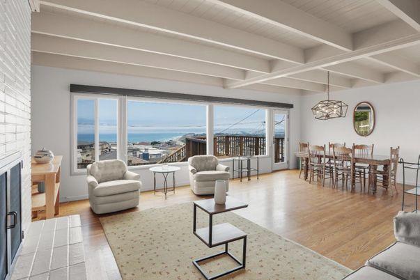 Dining room, Fireplace, Interior, Living room, Pendant Lights, Water, Wood Texture Flooring