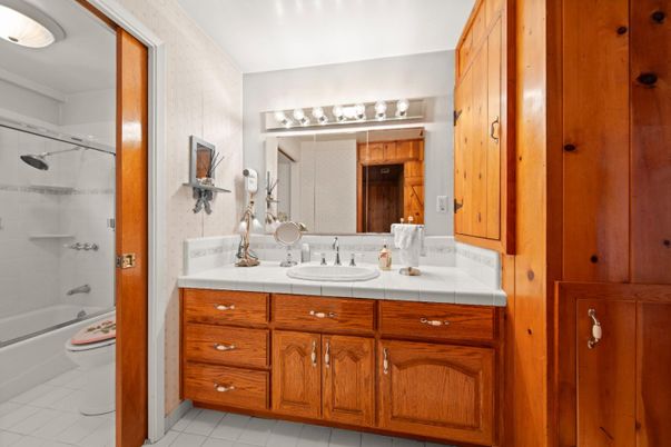 Bathroom, Dual Sink Vanities, Glass Shower, Interior, Tile Countertops