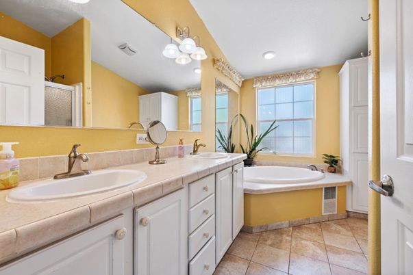 Bathroom, Dual Sink Vanities, Interior, Recessed Lighting, Tile Countertops