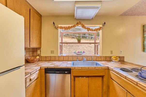 Interior, Kitchen, Stainless Steel Appliances, Tile Countertops
