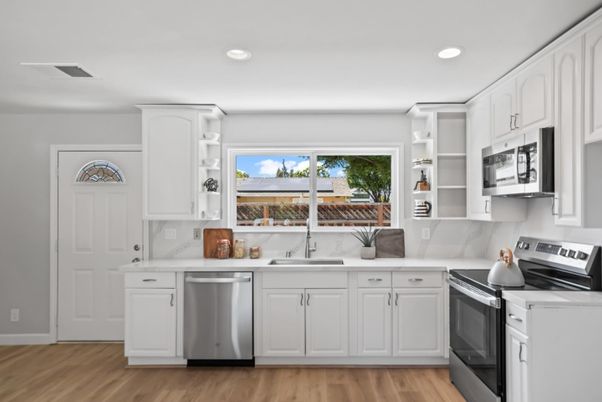 Interior, Kitchen, Recessed Lighting, Stainless Steel Appliances, Wood Texture Flooring