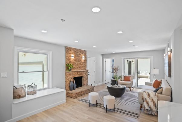 Fireplace, Interior, Living room, Recessed Lighting, Stone Walls, Wood Texture Flooring