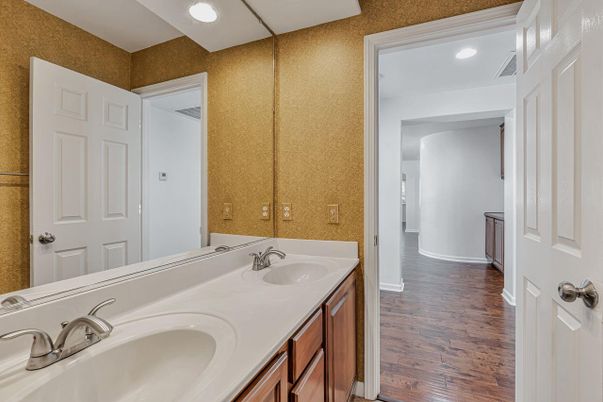 Bathroom, Dual Sink Vanities, Interior, Recessed Lighting, Wood Texture Flooring