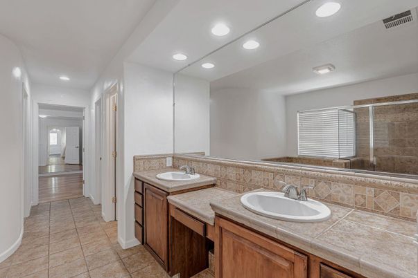 Bathroom, Dual Sink Vanities, Glass Shower, Interior, Recessed Lighting, Tile Countertops