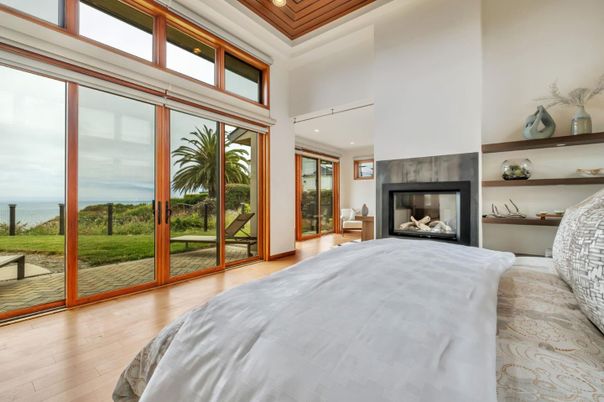 Bedroom, Fireplace, Interior, Recessed Lighting, Water, Wood Texture Flooring