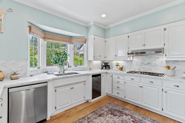 Interior, Kitchen, Marble Walls, Recessed Lighting, Stainless Steel Appliances, Wood Texture Flooring