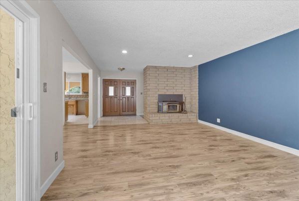 Empty room, Fireplace, Interior, Recessed Lighting, Wood Texture Flooring