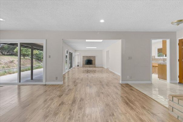 Empty room, Fireplace, Interior, Recessed Lighting, Wood Texture Flooring