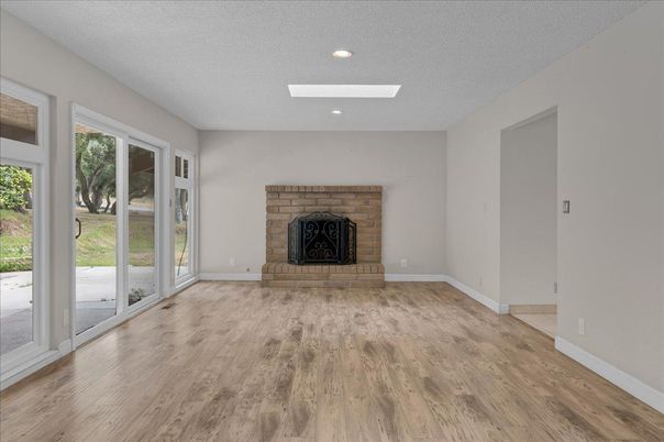 Empty room, Fireplace, Interior, Recessed Lighting, Wood Texture Flooring