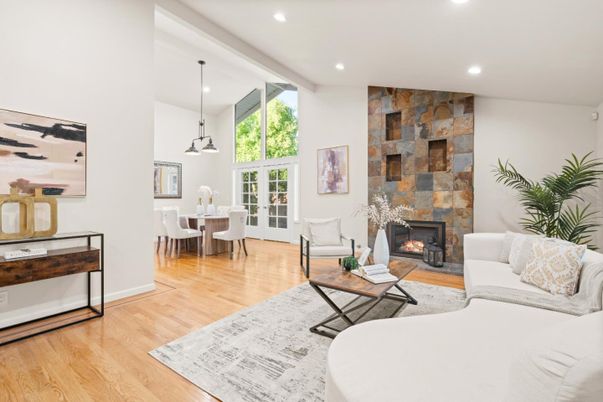 Dining room, Fireplace, Interior, Living room, Pendant Lights, Recessed Lighting, Stone Walls, Wood Texture Flooring
