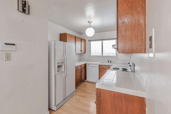 Interior, Kitchen, Tile Countertops, Wood Texture Flooring