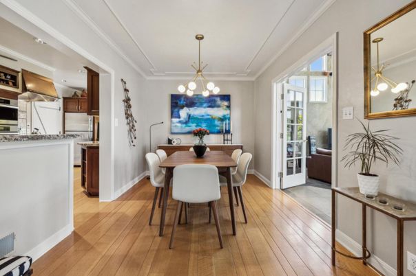 Chandelier, Dining room, Interior, Kitchen, Pendant Lights, Recessed Lighting, Stainless Steel Appliances, Wood Texture Flooring