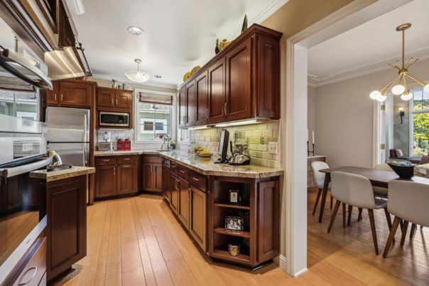 Dining room, Interior, Kitchen, Pendant Lights, Recessed Lighting, Stainless Steel Appliances, Wood Texture Flooring