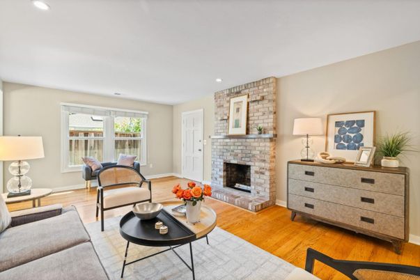 Fireplace, Interior, Living room, Recessed Lighting, Stone Walls, Wood Texture Flooring