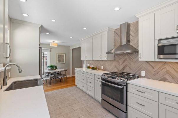 Dining room, Interior, Kitchen, Recessed Lighting, Stainless Steel Appliances, Wood Texture Flooring