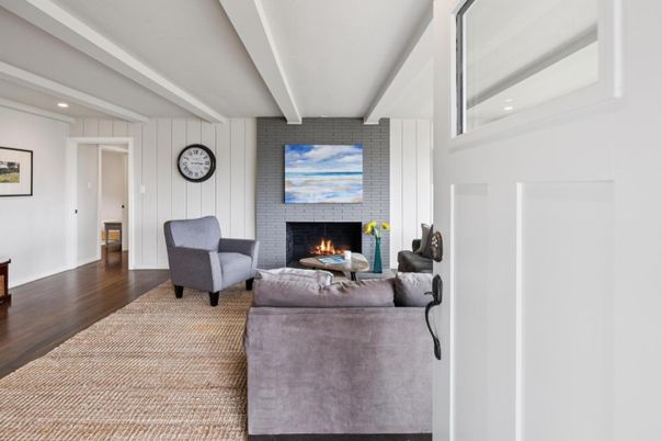 Fireplace, Interior, Living room, Recessed Lighting, Stone Walls, Wood Texture Flooring