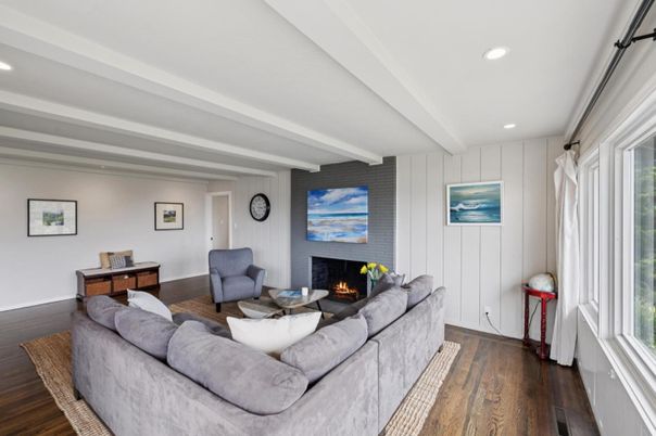 Fireplace, Interior, Living room, Recessed Lighting, Stone Walls, Wood Texture Flooring