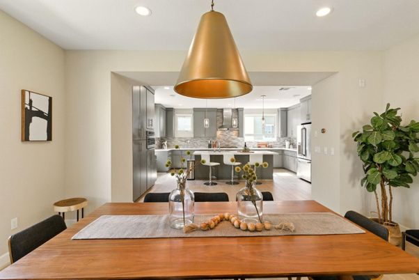 Dining room, Interior, Kitchen, Pendant Lights, Recessed Lighting, Stainless Steel Appliances, Wood Texture Flooring