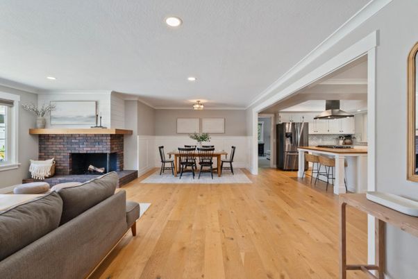 Dining room, Fireplace, Interior, Kitchen, Living room, Recessed Lighting, Stainless Steel Appliances, Wood Texture Flooring
