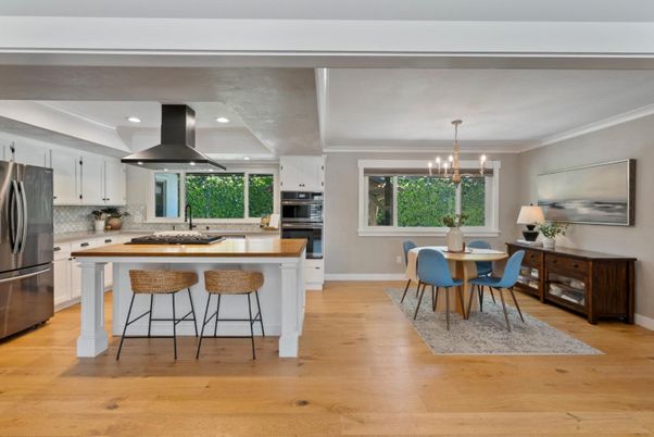 Chandelier, Dining room, Interior, Kitchen, Pendant Lights, Recessed Lighting, Stainless Steel Appliances, Wood Texture Flooring