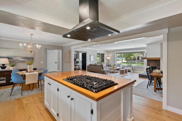 Chandelier, Dining room, Fireplace, Interior, Kitchen, Living room, Pendant Lights, Recessed Lighting, Stainless Steel Appliances, Wood Texture Flooring