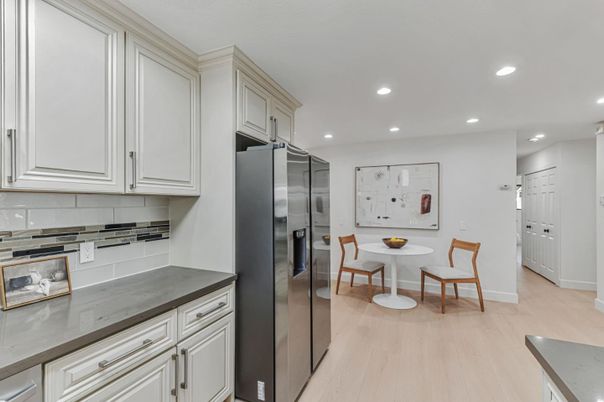 Dining room, Interior, Kitchen, Recessed Lighting, Stainless Steel Appliances, Wood Texture Flooring
