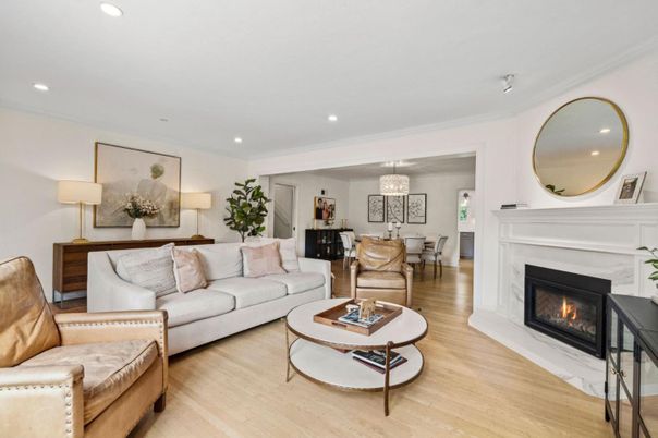 Chandelier, Dining room, Fireplace, Interior, Living room, Pendant Lights, Recessed Lighting, Wood Texture Flooring