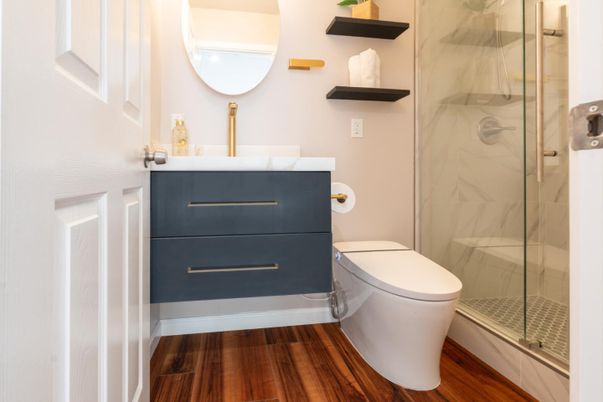 Bathroom, Glass Shower, Interior, Marble Walls, Wood Texture Flooring