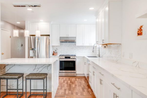 Interior, Kitchen, Marble Walls, Pendant Lights, Recessed Lighting, Stainless Steel Appliances, Wood Texture Flooring